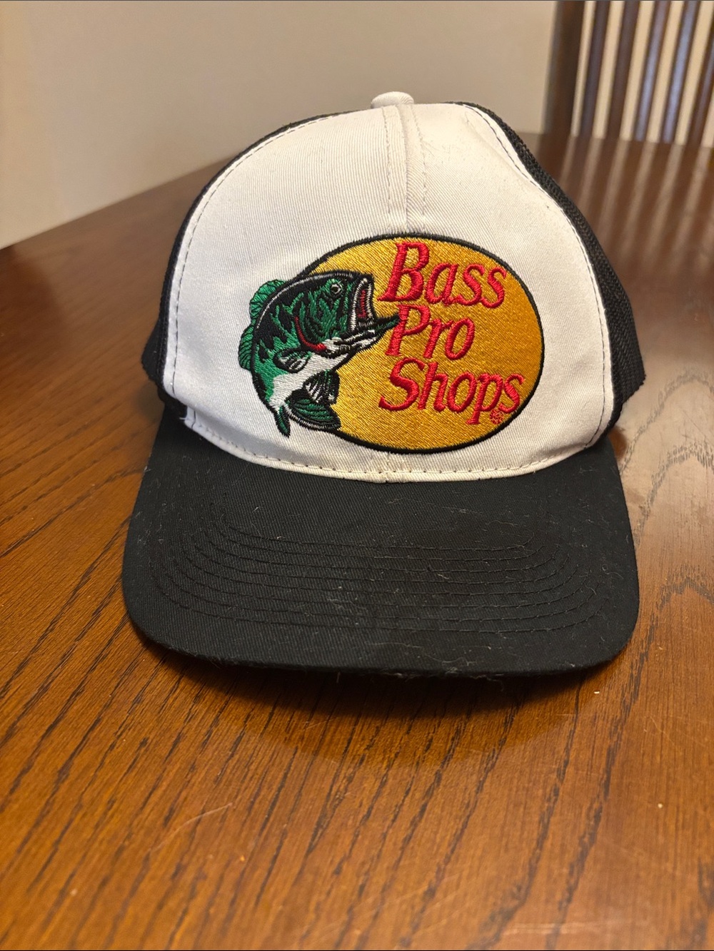Bass Pro Shops White and Black Trucker Hat with Yellow Patch
